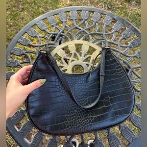 Mini black leather shoulder bag